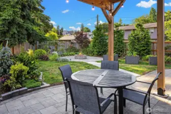 Covered patio off of dining room accessible through double paneled doors.