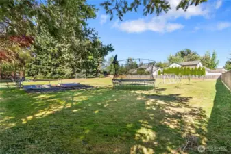 2nd area beyond the backyard for playing. Garden boxes included