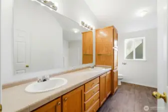 Dual sinks and tons of cabinets and counter space.