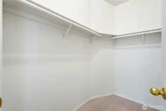 The generous walk-in closet is sure to please anyone who loves extra storage and organization.