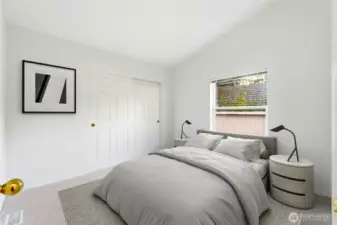 Utility room with door leading out to back deck/yard.