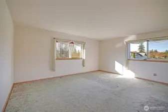 Primary bedroom has plenty of room for bedroom furniture options.