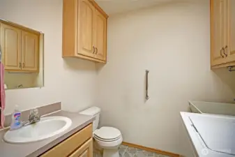Guest bathroom connected to the laundry room