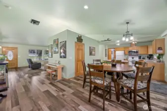 hallway enters into the dining room kitchen area