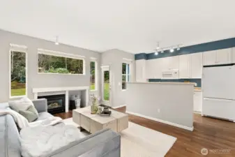 More natural light + cozy gas fireplace.