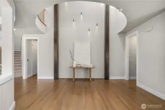 Impressive double-height foyer enhanced by skylights and abundant natural light