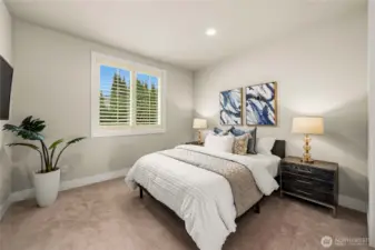 A private guest suite on the main floor, offering comfort and flexibility