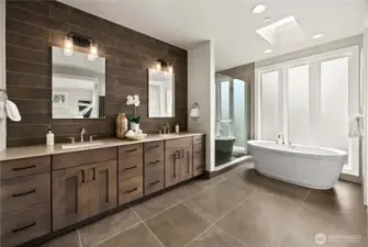 Spa-inspired primary bath with dual vanities