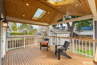 Skylights bring in light, tongue and groove ceiling and can lights.