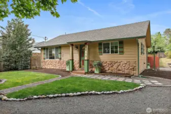 You'll smile every time you pull up to this warm, welcoming home—ready to relax into your own haven!