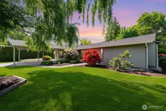 Welcoming entrance with beautiful landscaping!