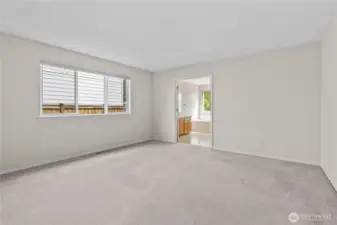 Primary Bedroom with Large Window allows plenty of light in! Blinds are included!