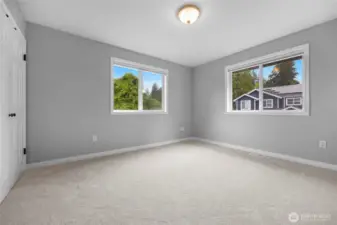 The fourth bedroom.  Each bedroom is on a corner and has light and bright windows.
