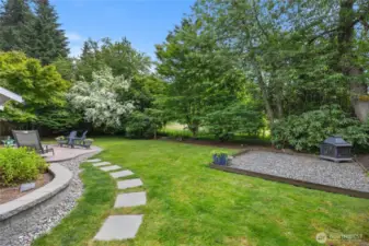 The spacious lawn, perfect for entertaining, lawn games, gardening and whatever else you can think of