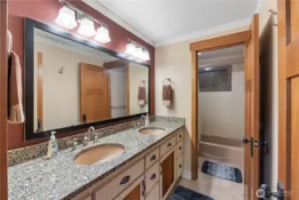 Double sink cabinet with drawers down & bath/shower/toilet in back!