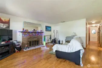 As you walk in the front door you will have the living room off to your right