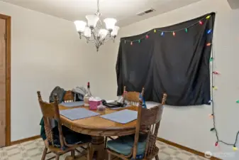 Dinning room showing door to utility room, work room and garage