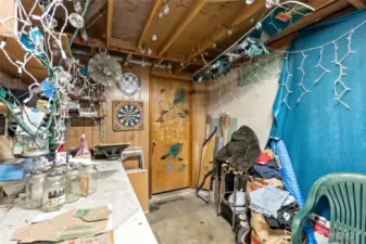 Work room with access to the 2 car garage