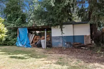 Storage shed to the left of the pool