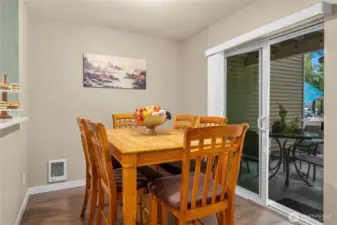 Dining area opens to a covered patio.