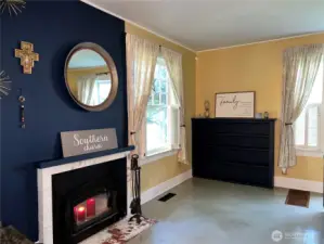 Cozy up by the wood burning fireplace on those cold rainy days.
