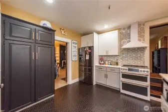With modern cabinetry, full height backsplash and high end appliances, this kitchen will surely be your favorite room in the house!
