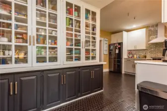 No shortage of cabinetry here to store your essential and favorite foods, store your kitchen cabinets and showcase your finest china.