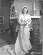 Elizabeth Poinsett, a pioneer in the Lakewood community and  daughter of Iva Alice and Julius Mann. Pictured in the living room of the home.
