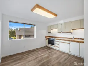 Kitchen with eating space, ready for your vision.