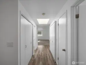 Hall front front door with large skylight to bring in lots of natural light.