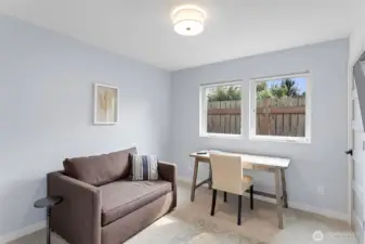 Main floor office/bedroom with closet