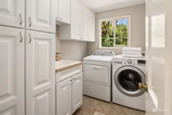 Laundry room with sink & great storage.