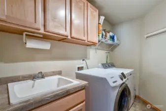 Upstairs laundry with deep utility sink