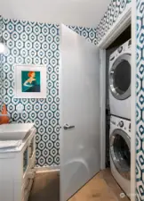 Laundry in 1/2 bath, plus extra storage.