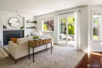 Light filled living room opening to back yard
