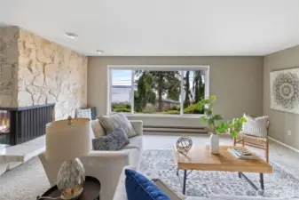 The living room is so open and spacious. You can see a bit more of the beautiful fireplace here...