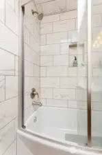 New tile, fixtures & shower door here too!