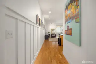 Tastefully designed with wainscoting, tall ceiling and art walls.