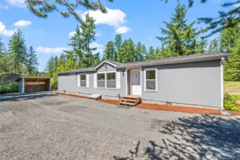 Move-in ready home on a spacious lot with fresh landscaping and peaceful wooded surroundings. Enjoy low-maintenance living just minutes from town.