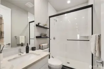 Downstairs bathroom between guest bedroom and office.