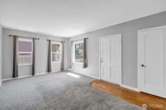 Living room with wood floor entry
