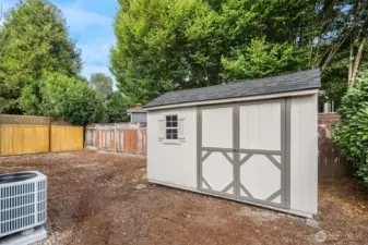 Private storage shed and recently installed new HVAC system.