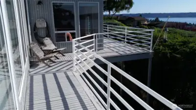 The home has nearly a complete wrap around deck for outdoor living enjoyment year-round.