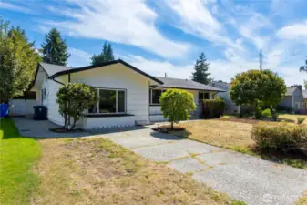 Driveway parking and separate entrance on the left