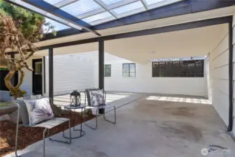 Grand covered porch perfect for entertaining in any weather