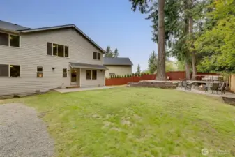 Backyard looking into the house.  Just shy of a quarter of an acre!
