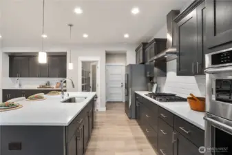**Photos are of a different home, same plan in the community. Some colors, Features and specs will vary**