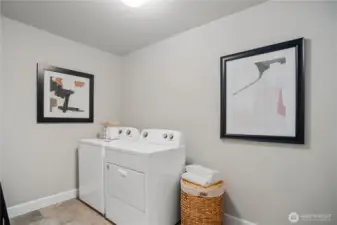 **Photos are of a different home, same plan in the community. Some colors, Features and specs will vary**
