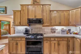 Stove has recently been upgraded to gas and added a low profile microwave. Space is wired for electrical also.