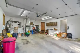 Garage incudes a large storage room to the right.